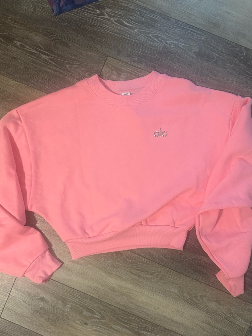 ALO Yoga Cropped Crewneck Sweatshirt in Coral Pink